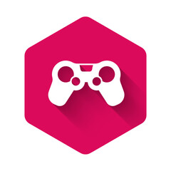 Poster - White Gamepad icon isolated with long shadow background. Game controller. Pink hexagon button. Vector