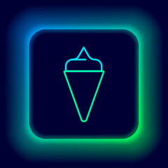 Sticker - Glowing neon line Ice cream in waffle cone icon isolated on black background. Sweet symbol. Colorful outline concept. Vector