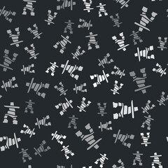 Sticker - Grey Inukshuk icon isolated seamless pattern on black background. Vector