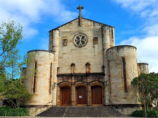 Wall Mural - Facade of the church in North Sydney, Australia against a blue sky