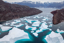 Aerial View Of Ice Formation And Icebergs Along The Coast, Sermersooq, Greenland.