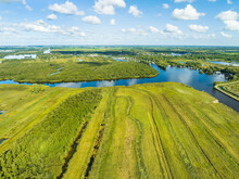 Aerial View Of National Park De Alde Feanen With Reedland, Lake And Village Earnewald, Friesland, Netherlands.