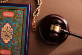 Fototapeta Konie - sharia law gavel hammer prayer beads and holy koran book