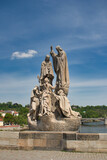 Fototapeta Paryż - Statue of St. Cyril and St. Methodius on Charles bridge, Prague. Czech Republic.
