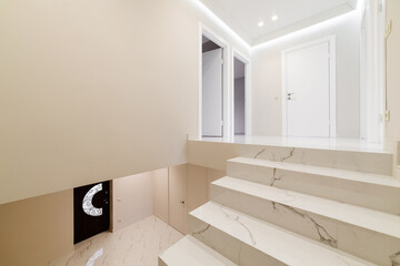 Wall Mural - bright stairs in a new clean white house with a designer interior