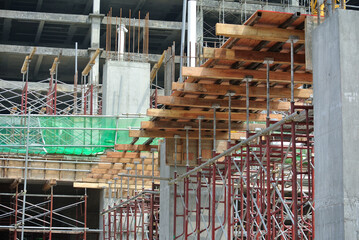 Wall Mural - JOHOR, MALAYSIA -APRIL 13, 2016: Scaffolding used as the temporary structure to support platform, form work and structure at the construction site. Also used it as a walking platform for workers. 
