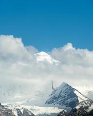 Poster - Beautiful landscape of snowy mountains in clouds in Ladakh, Zanskar