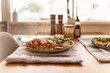 © Austockphoto - Close up shot of healthy vegetable based meal on kitchen table