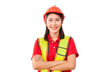 Young female warehouse worker standing in warehouse with arms crossed, Smiling woman in hard hat looking at camera with arms crossed