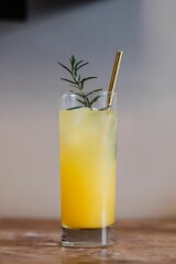 Poster - Orange Cocktail with rosemary and a metal straw