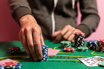 Wall Mural - The player makes a bet in poker.