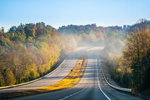 Fog Mist Covering Forest Trees At Sunrise In West Virginia Rural Countryside By New River Gorge In Morning Autumn Fall Near Interstate Road Highway 64