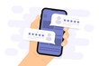 © SMUX - Hand holding phone with review rating. User reviews with good and bad rate on smartphone screen. Customer feedback review experience rating. Clients choosing satisfaction rating and leaving reviews