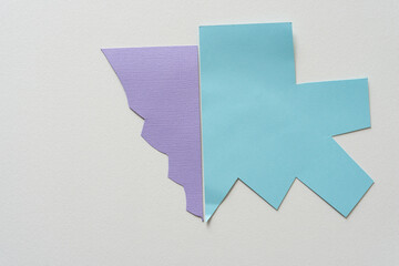 Canvas Print - two paper shapes - one violet and one blue on blank paper