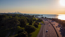 Coastal Highway Approaching Distant City Skyline At Sunset- Cleveland, OH