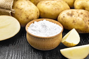 Poster - Starch potato in bowl on wooden board