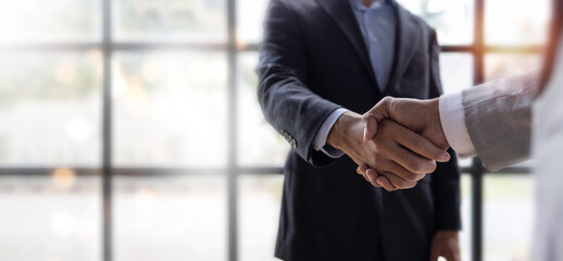 business handshake for teamwork of business merger and acquisition,successful negotiate,hand shake,t