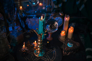 Witch altar. Concept of fortune telling and predictions of fate, candle magic and wicca elements on a table