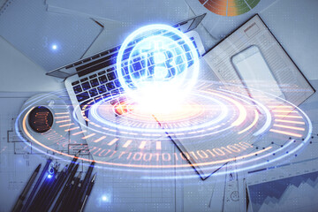 Poster - Blockchain theme hologram drawings over computer on the desktop background. Top view. Multi exposure. Concept of cryptoeconomy.
