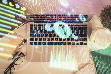 Poster - Double exposure of data theme drawing hologram over topview work table background with computer. Concept of technology.