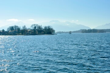 Sticker - Beautiful seascape with mountains and trees in the distance