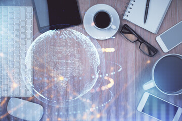 Poster - Double exposure of map hologram drawing over desktop. Top view. International connection concept.