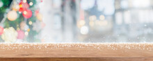 Empty Wood Table Top On Blur With Bokeh Christmas Tree And New's Year Decoration On Window Banner Background With Snowfall - Can Be Used For Display Or Montage Your Products.