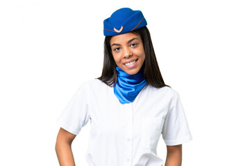 Wall Mural - Airplane stewardess African american woman over isolated background laughing