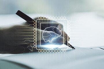 Poster - creative artificial intelligence concept with human brain hologram and man hand writing in notebook 
