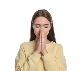 Wall Mural - Woman with clasped hands praying on white background