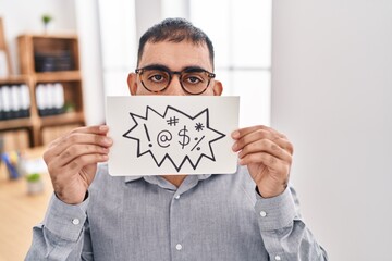 Poster - Middle east man with beard holding banner with swear words sticking tongue out happy with funny expression.