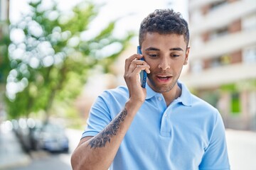 Poster - African american man talking on the smartphone at street