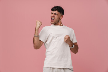 Wall Mural - Young stylish man with closed eyes and opened mouth dancing