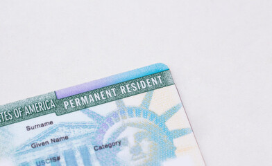 United States passport, social security card and permanent  resident (green) card on white background. Immigration concept