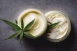Cosmetics and tinctures with marijuana leaf, hemp extract and CBD oil. Natural, herbal organic cannabis cream and lotion in jar