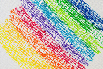 Rainbow pastel strokes on white textured paper