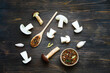 Different fresh wild mushrooms and spices on wooden background. Autumn Cep Mushrooms. Concept organic food mushroom. Close-up