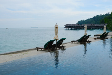 Beautiful infinity pool overlooking Pangkor laut island.