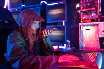 Fototapete - Hack program concept. Professional woman hacker using keyboard send coding bad data and error into software computer online system and spreading to global stolen personal information.