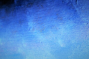 Wall Mural - Abstract blue textured background. Bright saturated color. A wall painted with a rough brush.