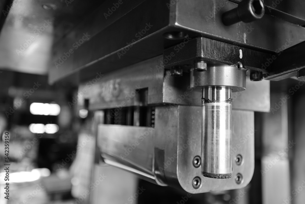 Sheet Metal Stamping Tool Die for Automotive Precision Parts on The Numerical Control Milling Machine Table. Tandem Stamping System. At a High Quality Technology Factory. Black and White Photography.