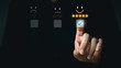© Sea Studio - Customer service and Satisfaction concept ,Business people are touching the virtual screen on the happy Smiley face icon to give satisfaction in service. rating very impressed.