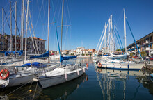Italy, Friuli Venezia Giulia, Grado, Sailboats Moored In Porto Mandracchio Marina