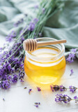 Fototapeta Lawenda - Jar with honey and fresh lavender flowers