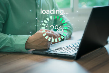 Poster - Businessman using a computer laptop to download and waiting to loading digital business data form website, concept of waiting for load of loading bar.