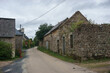 © Sebastian - Village of Kernevez, traditional stone houses with street, Botmeur, Brittany, France