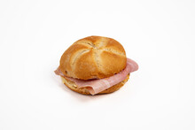 Kaiser roll with ham isolated on white background