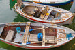 Small fishing boats in the harbor in Camogli, Italian Riviera, Liguria, Italy