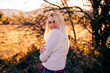 © Adriana Nikolova - beautiful blonde woman in autumn park with beautiful sunlight