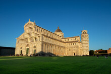 Pisa Tower And Cathedral Sunset Light Colors Against Blue Sky